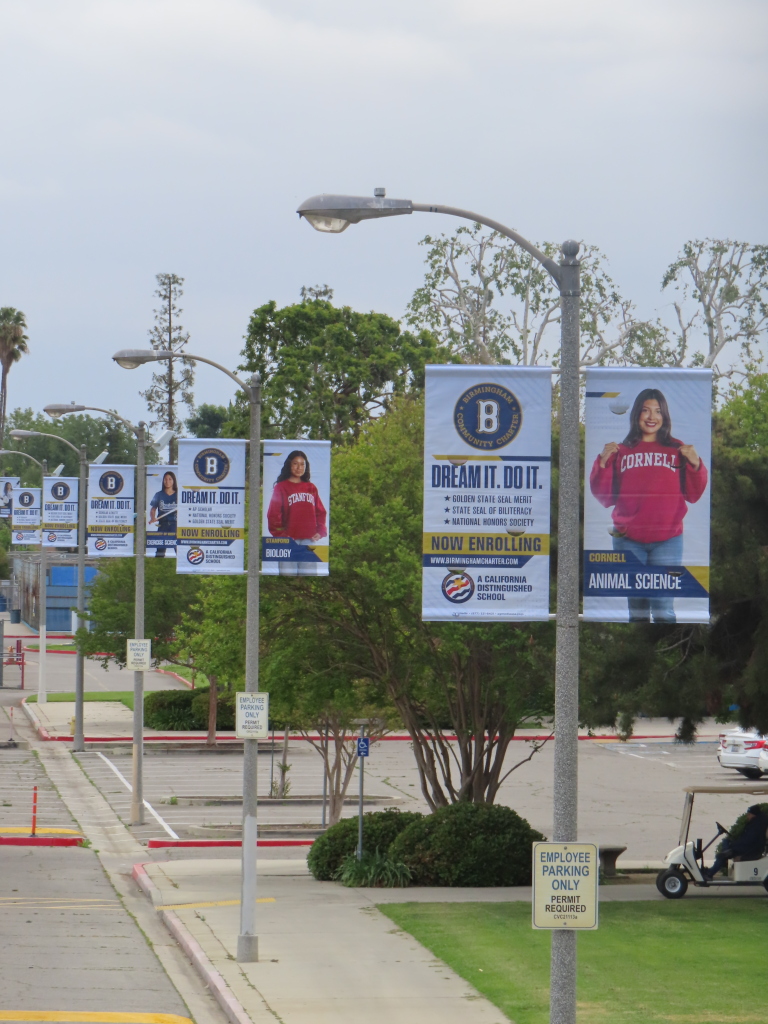 Birmingham Community Charter school banners with enrollment information