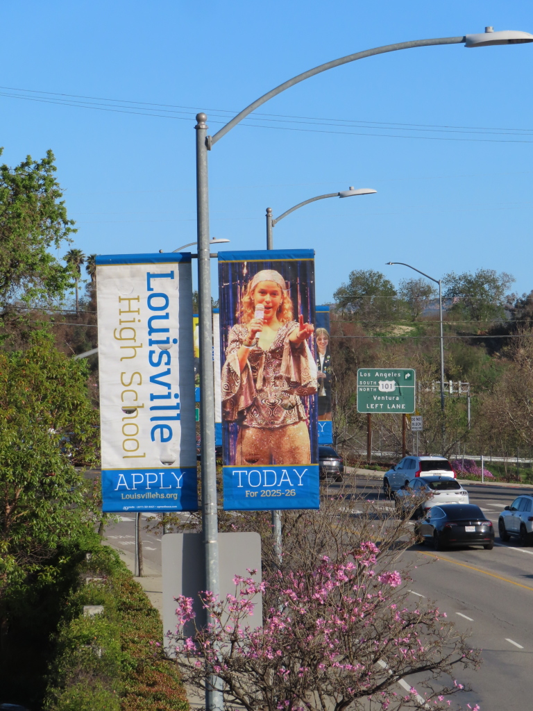 Louisville High School banner with student photo