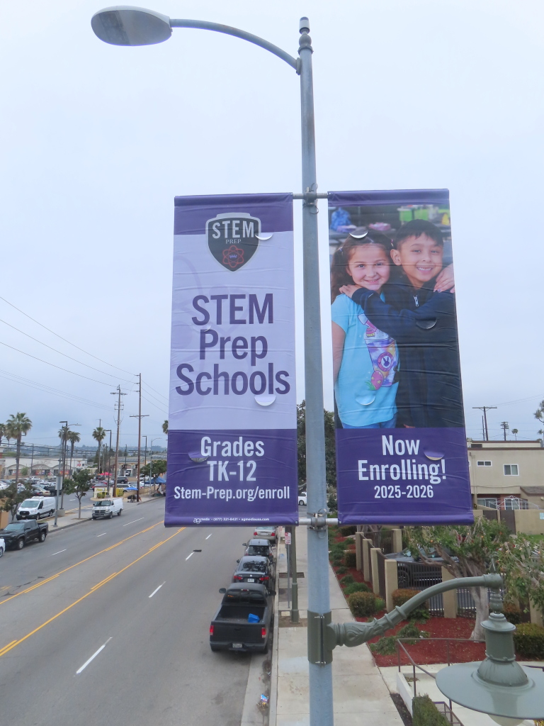 STEM Prep Schools light pole banners with purple branding